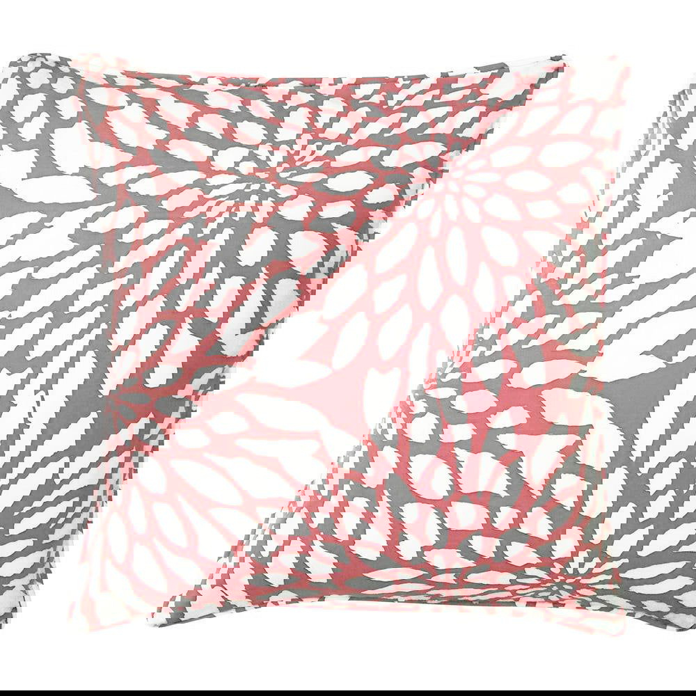 a batik pillow against a white background