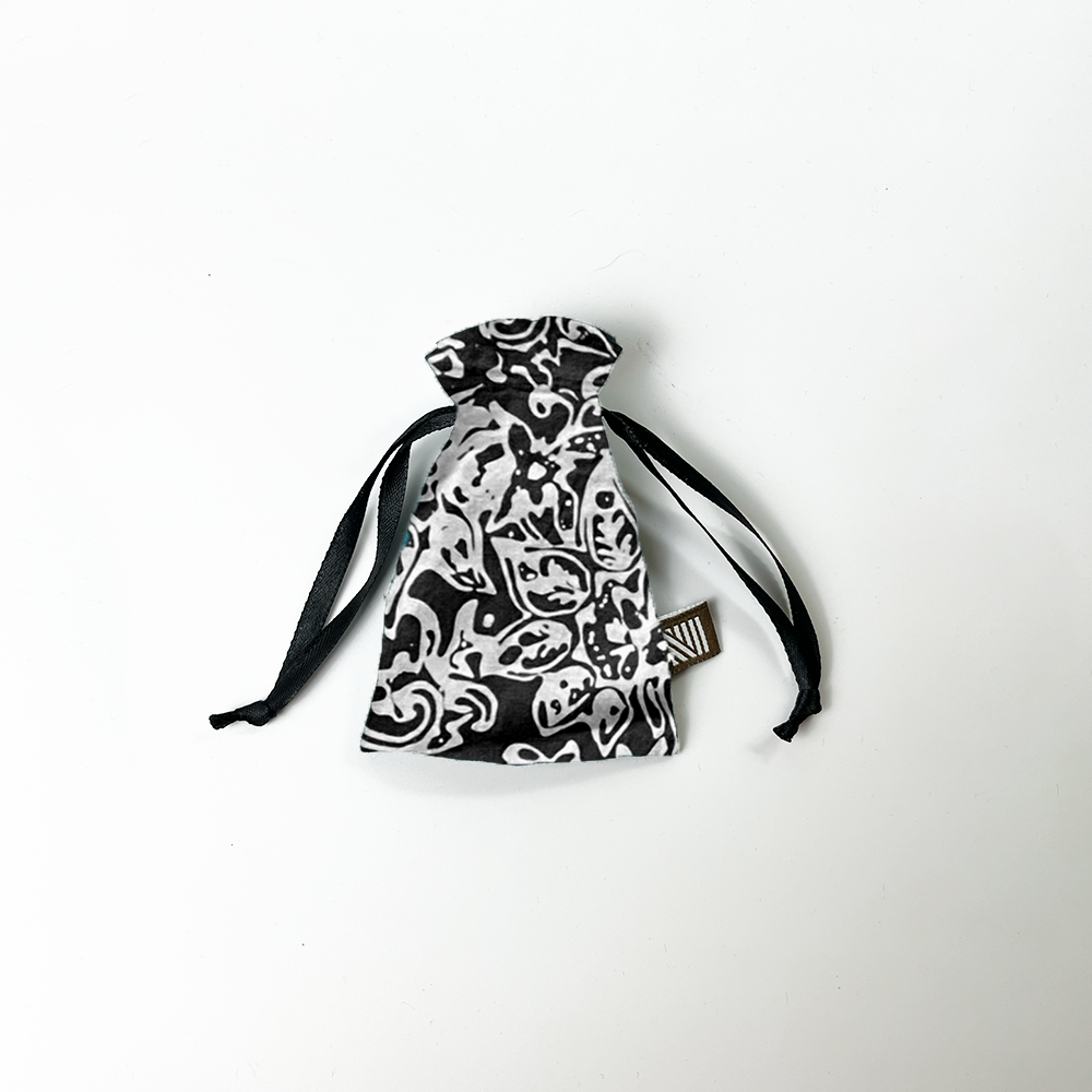 a whitebox photo of black floret pouch authentic batik