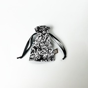 a whitebox photo of black floret pouch authentic batik
