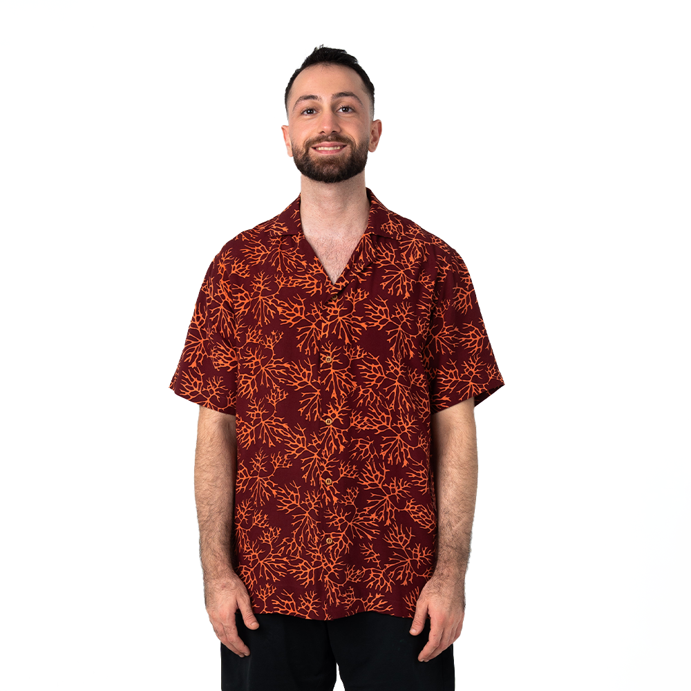Front view of men's Cuban shirt in bold maroon coral batik.