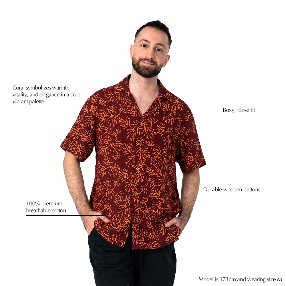 Men's maroon coral Cuban shirt with coral-inspired batik print and wooden buttons.