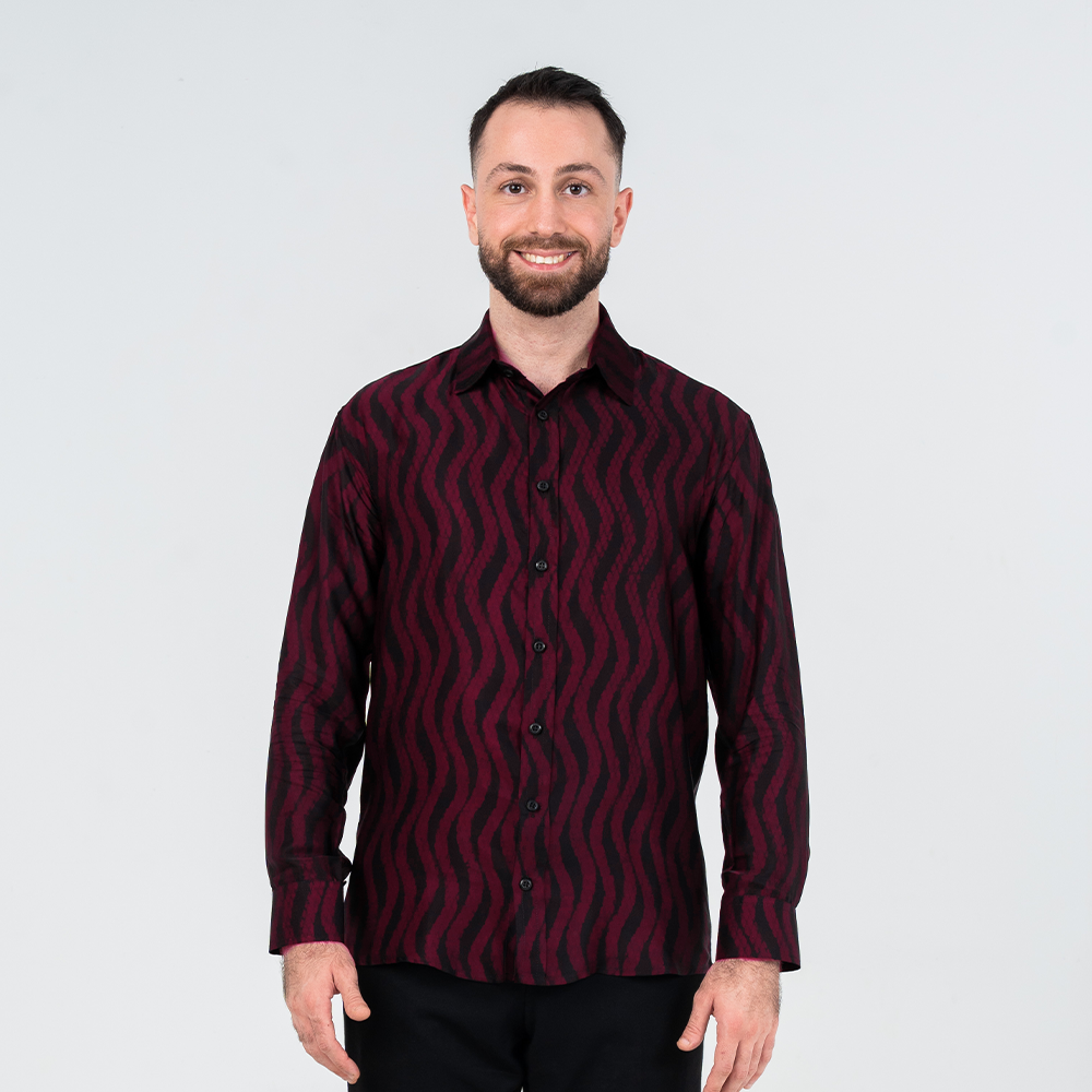 Front view of men's long-sleeved batik shirt in deep red and black Snakeskin design