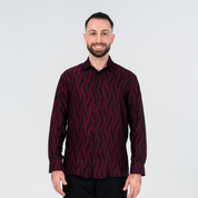 Front view of men's long-sleeved batik shirt in deep red and black Snakeskin design