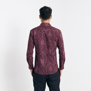 Back view displaying the continuous batik pattern and tailored cut
