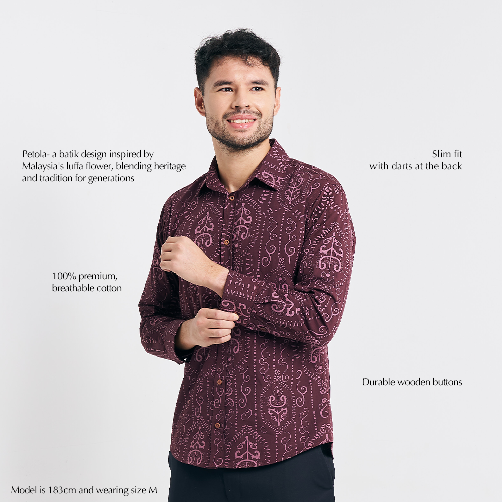 Studio shot with text overlays highlighting features of the batik shirt