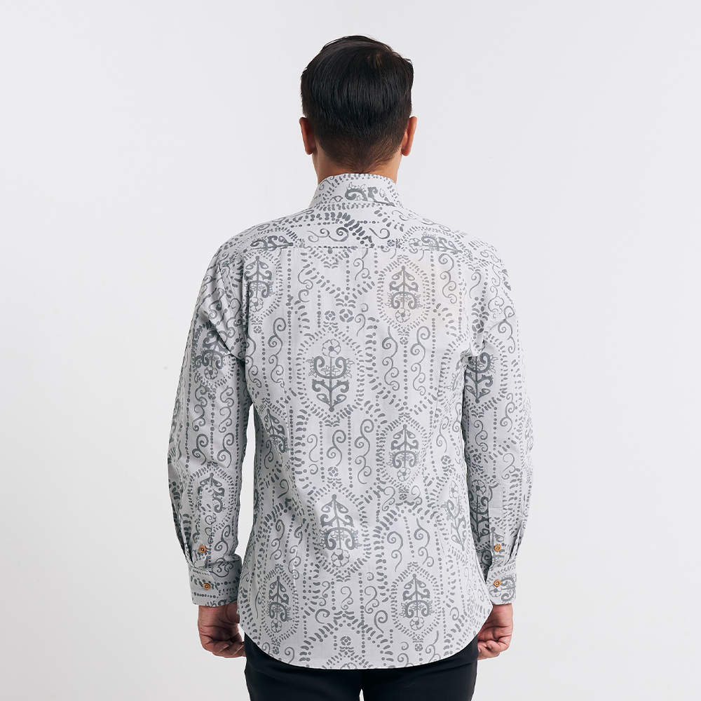 Back view displaying the seamless batik motifs and tailored cut