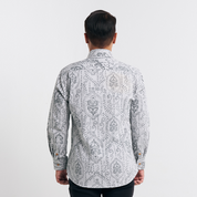 Back view displaying the seamless batik motifs and tailored cut