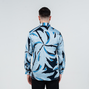 Back view of men's long-sleeved batik shirt in moonlight blue Palma motif, inspired by Southeast Asian flora
