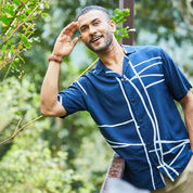 a men in cuban batik shirt in the pattern navy brush