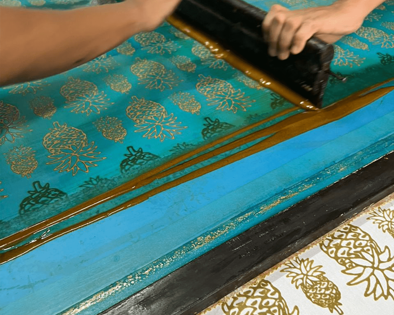 artisans making batik for batik boutique's new collection