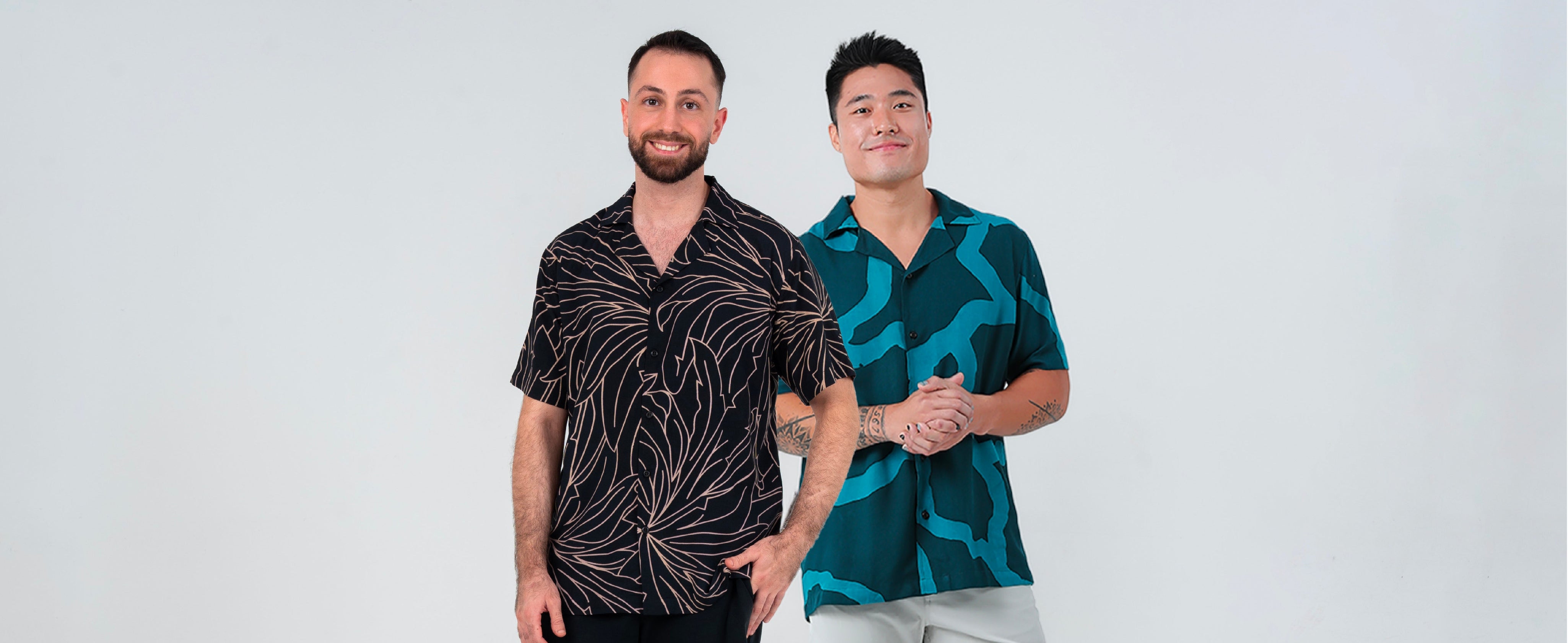 2 men facing camera wearing cotton modern batik men's shirts