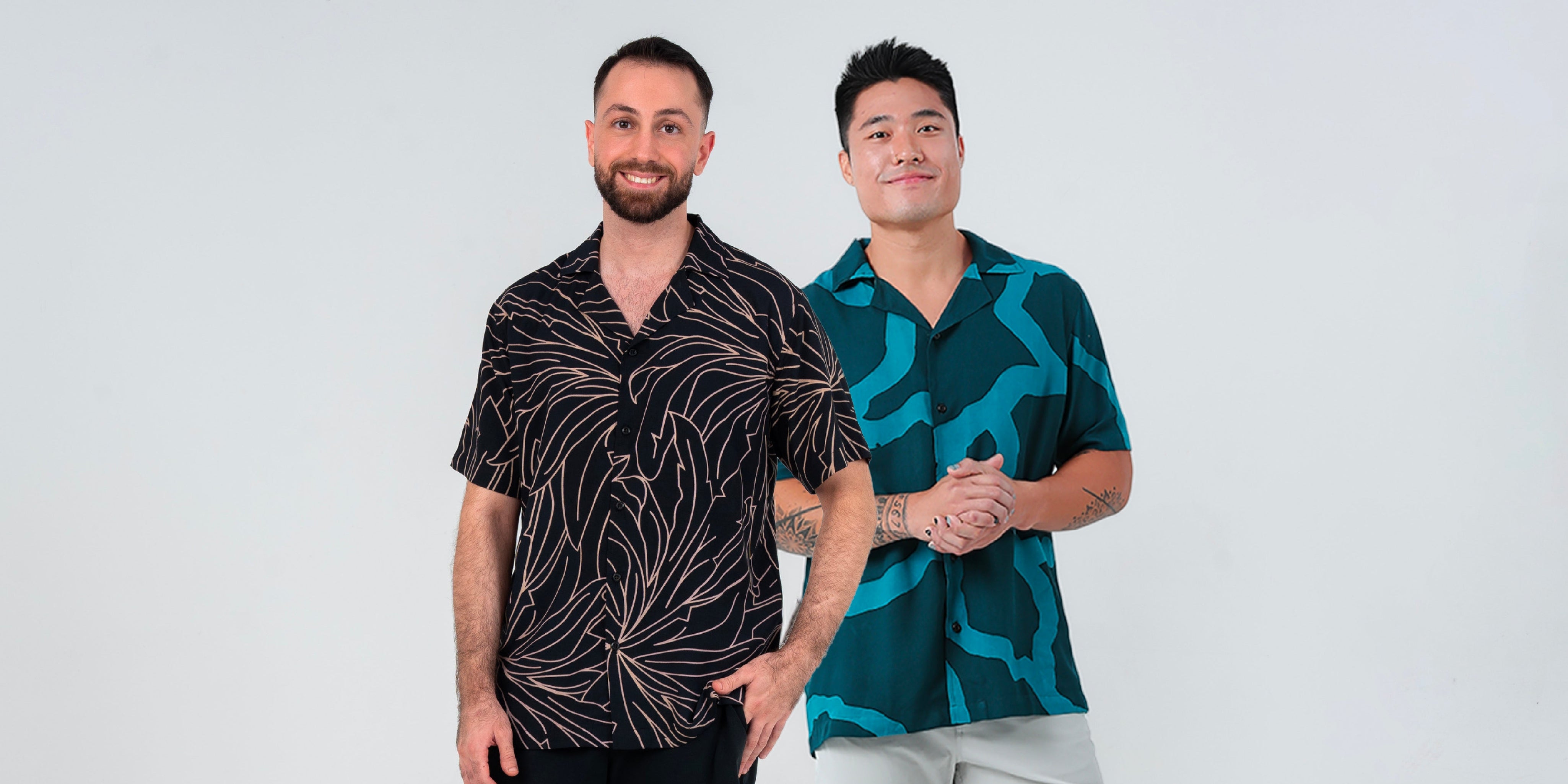 2 men facing camera wearing cotton modern batik men's shirts