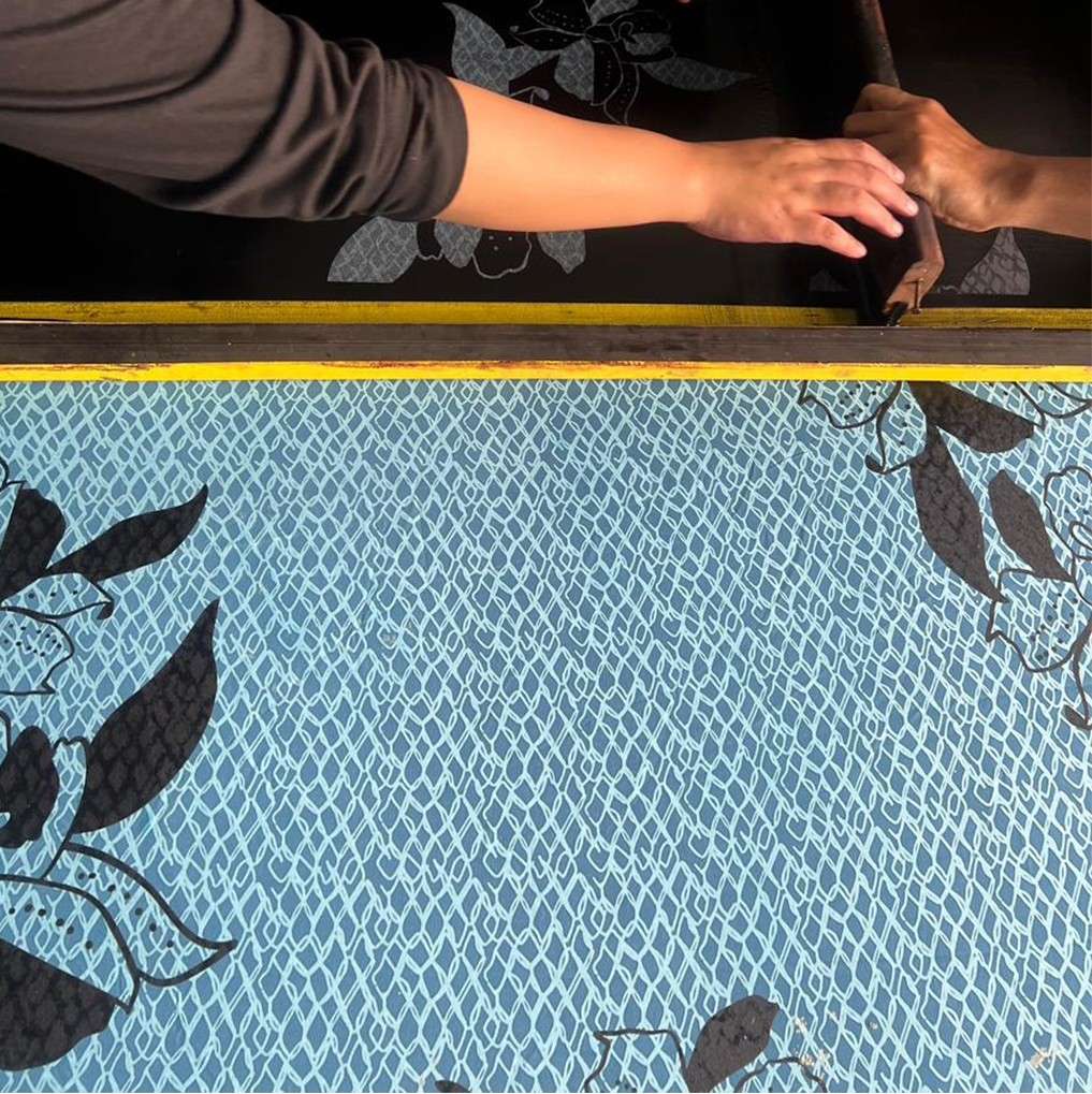 Artisan photo of the blooming lace print being produced