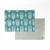 turquoise pineapple set against a white box 