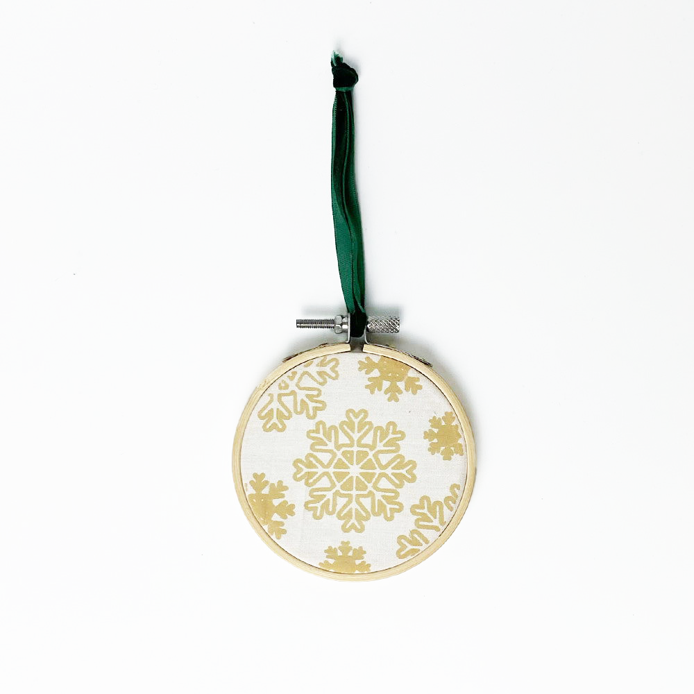 a whitebox photo of snowflake against a white background batik diy ornament