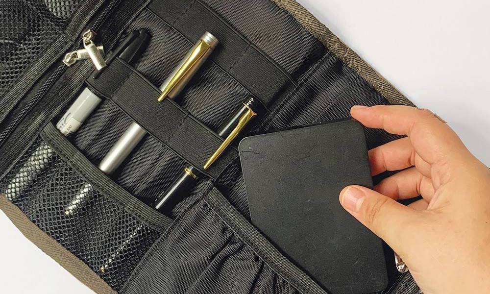 Teal ukir Travel pouch  showcasing pockets 