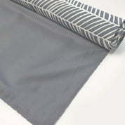 a batik table runner against a white background