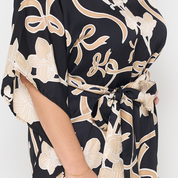 batik caftan dress closeup of onyx fleur