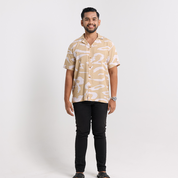 Model wearing the tan rimba cuban shirt 