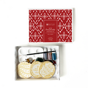 a photo of a gift set batik painting ornament against a white background in holly berry