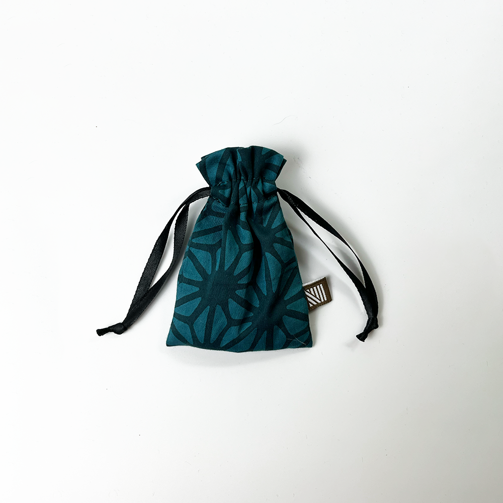 an authentic batik pouch in the pattern forest firework