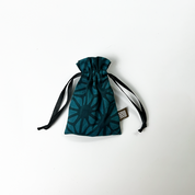 an authentic batik pouch in the pattern forest firework
