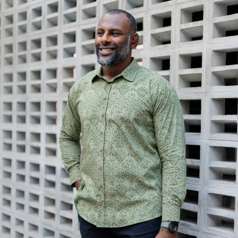 Man wearing long sleeve shirt in Men's Long-Sleeved Batik Shirt - Olive Anyam