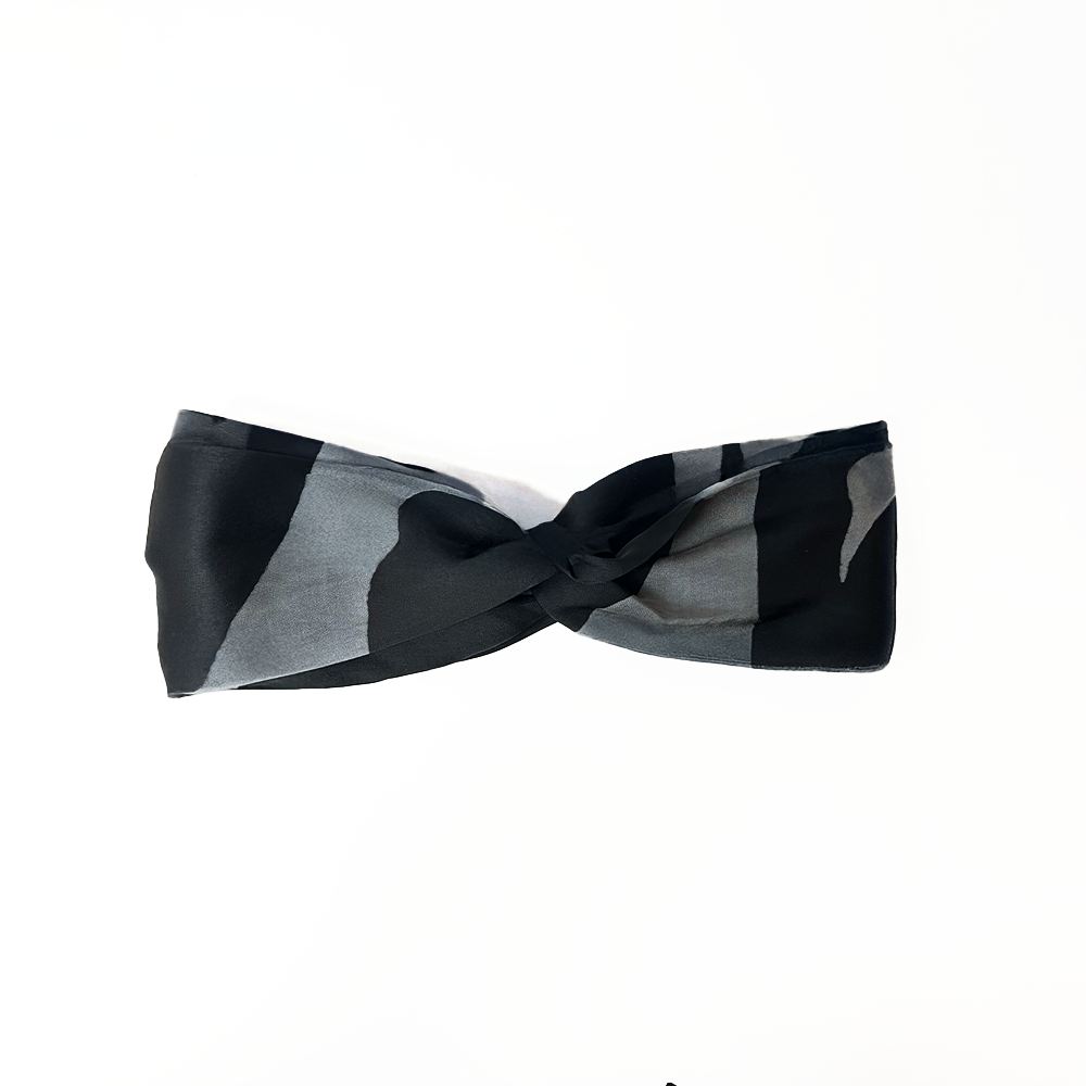 Front twisted view of Jet Chain batik headband in black and grey, made from premium silk cotton by Batik Boutique