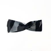Front twisted view of Jet Chain batik headband in black and grey, made from premium silk cotton by Batik Boutique
