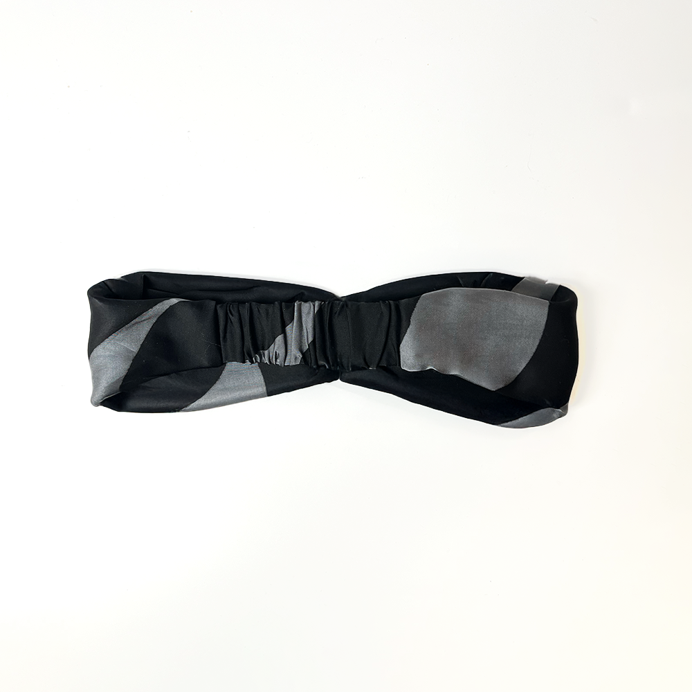 back view of Batik Boutique’s Jet Chain headband featuring elastic band for flexible fit, handcrafted from silk cotton batik.