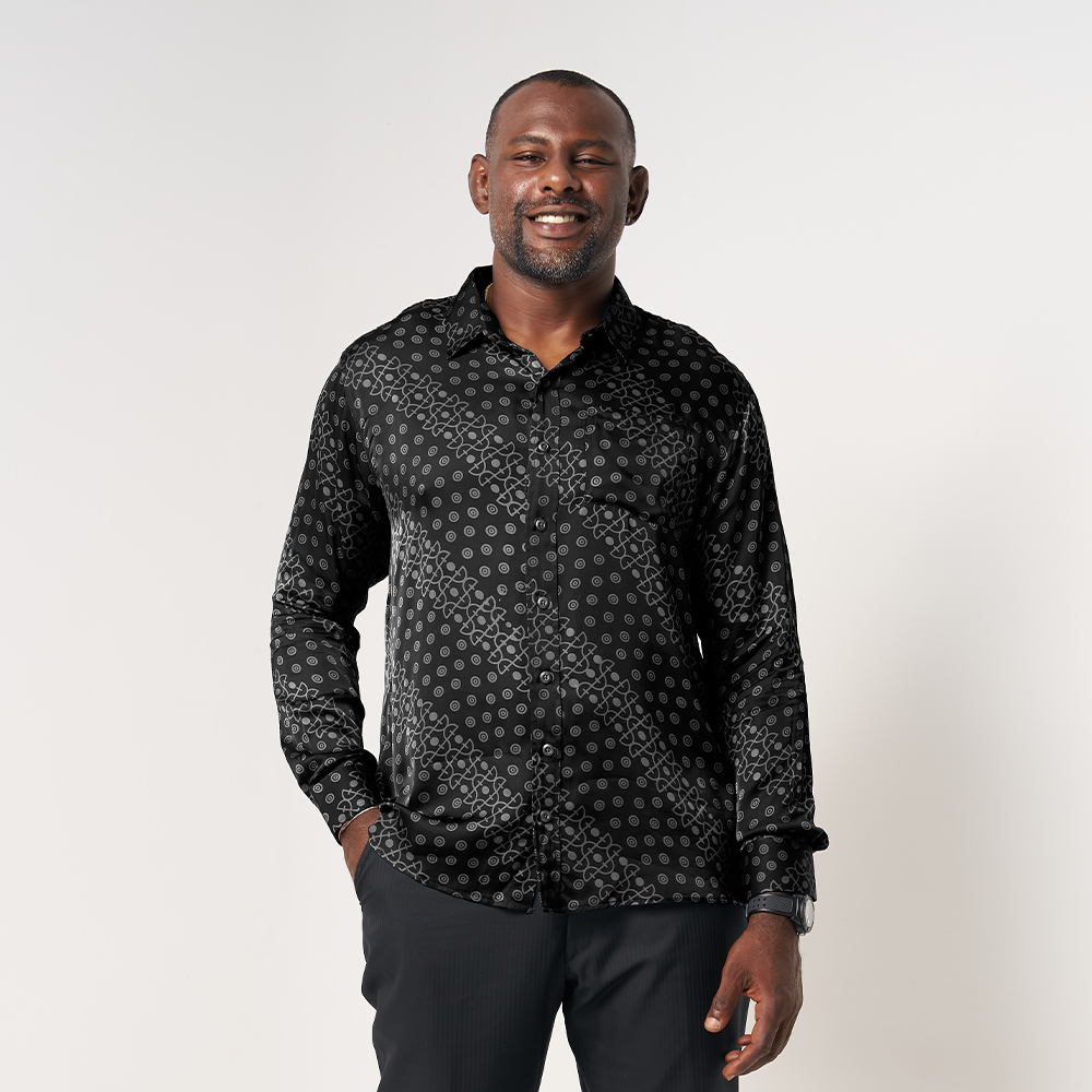 Front view of the Black Alur batik shirt worn by the model, with a pocket at the chest for a classic look and detailed batik design.