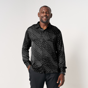 Front view of the Black Alur batik shirt worn by the model, with a pocket at the chest for a classic look and detailed batik design.