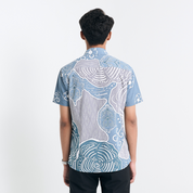 Back view displaying the seamless batik motifs and tailored cut