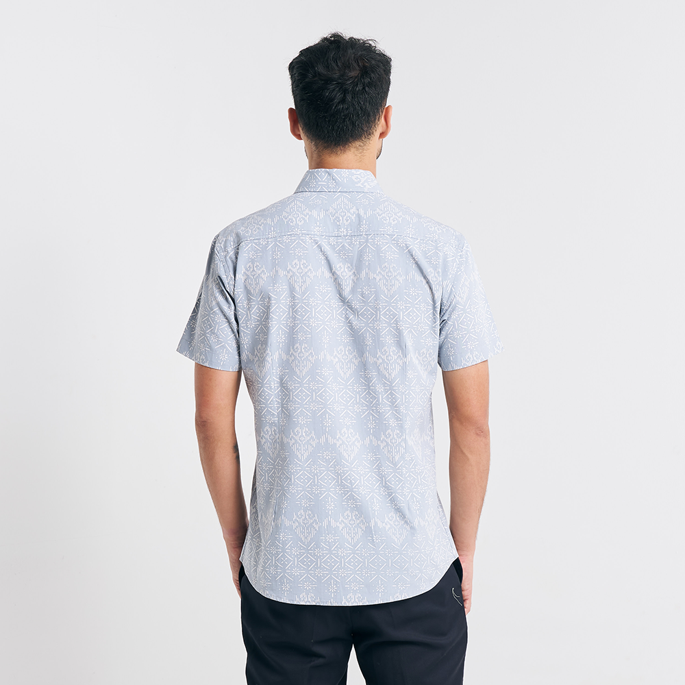 A rear view displaying the full batik pattern and tailoring details of the Grey Anyam shirt, ensuring a comfortable and stylish fit