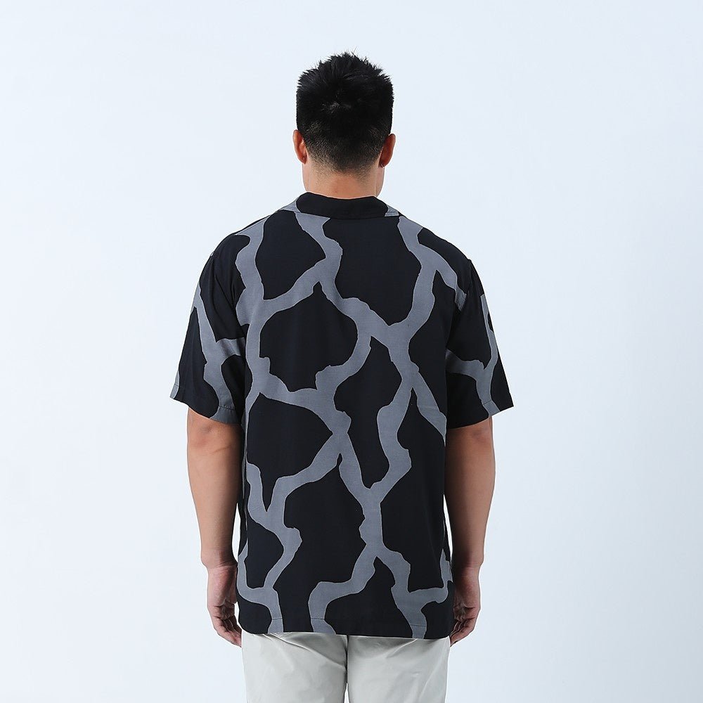 cuban in jet chain  close up of the back 