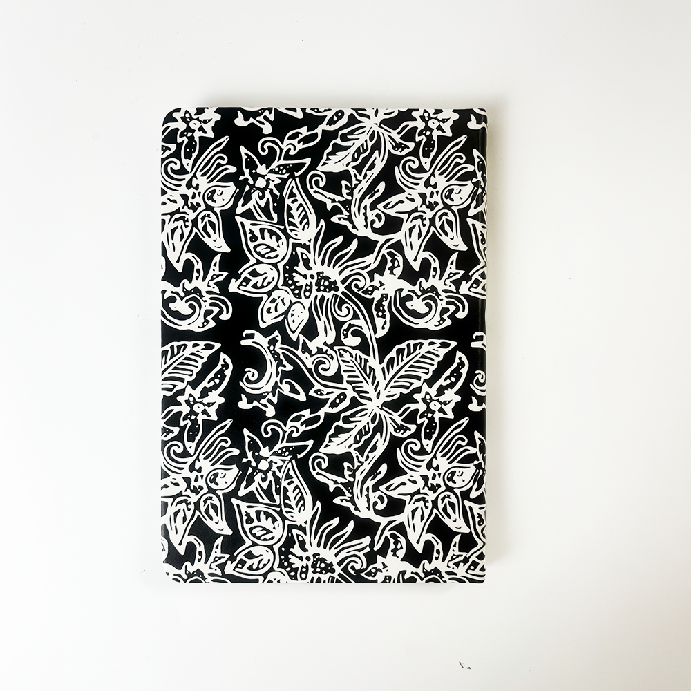 Handcrafted batik notebook with black background and white floral pattern — Black Floret design by Batik Boutique.