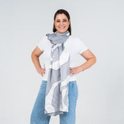 women wearing the silver rose scarf in a lifestyle photo 
