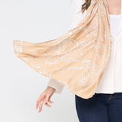 a closuep of batik scarf in the pattern tan orchid