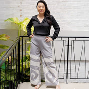Silver rose trouser being worn in a lifestyle photo 
