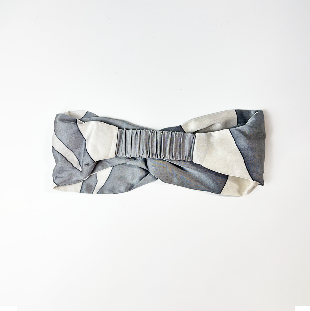 Front view of Silver Rose batik headband with hand-drawn floral batik design