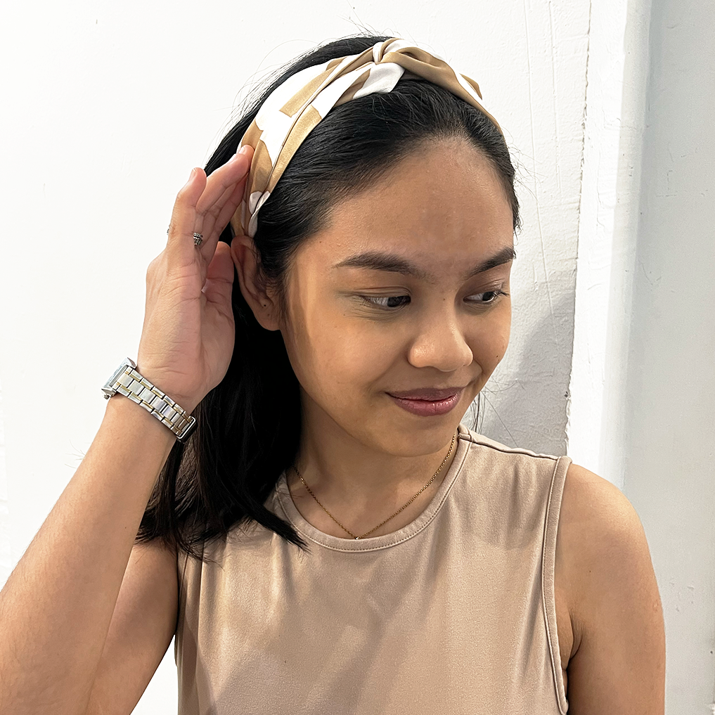 Tan Rimba Batik Headband worn by model – handmade batik accessory from Batik Boutique