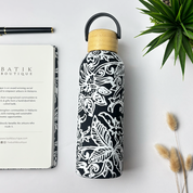 Stainless Steel Tumbler in Black Floret show with the black floret notebook beside 