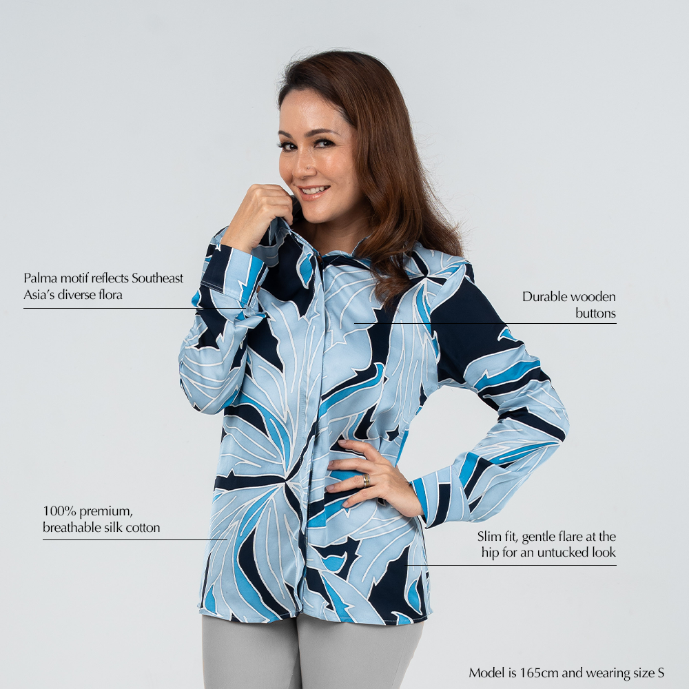 Women's Moonlight Palma shirt highlighting features like breathable silk cotton, wooden buttons, and hand-drawn Southeast Asian palm motif