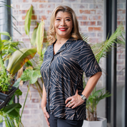 a woman in a batik cuban shirt lifestyle photo onyx palma