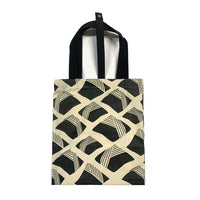 A batik totebag or even a shopping bag with pattern inspired from Nasi Lemak in black color and put on a white background. This photo show the back side of the bag