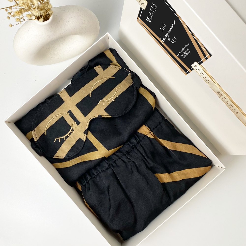 A batik loungewear set in black ecru print. Comes in a white box, exclusive ready for gifting