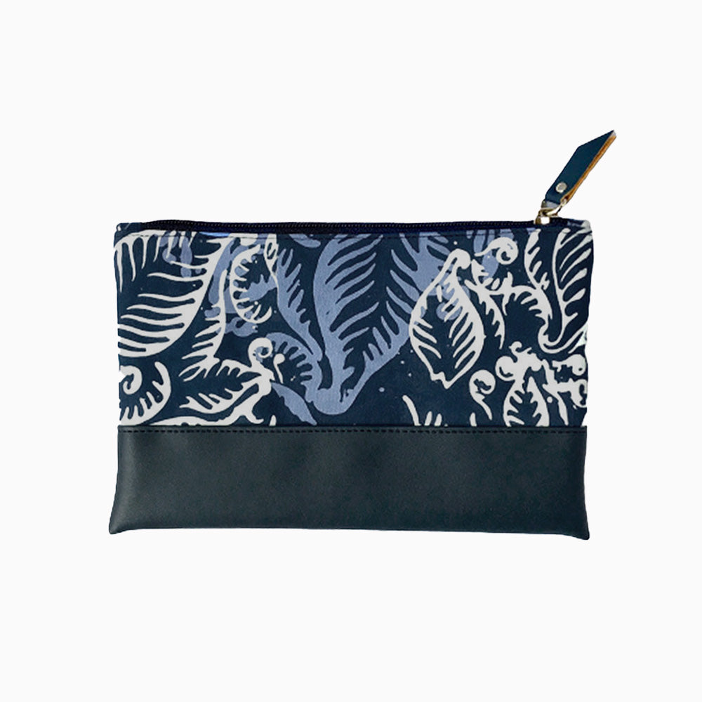 an upview whitebox photo of batik zip pouch in blue nautical fern pattern showing backside of the pouch