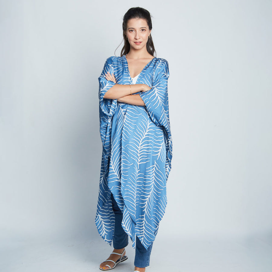 Front view of a model showcasing cotton silk batik Kimono in Cobalt Fern, handcrafted in Malaysia.