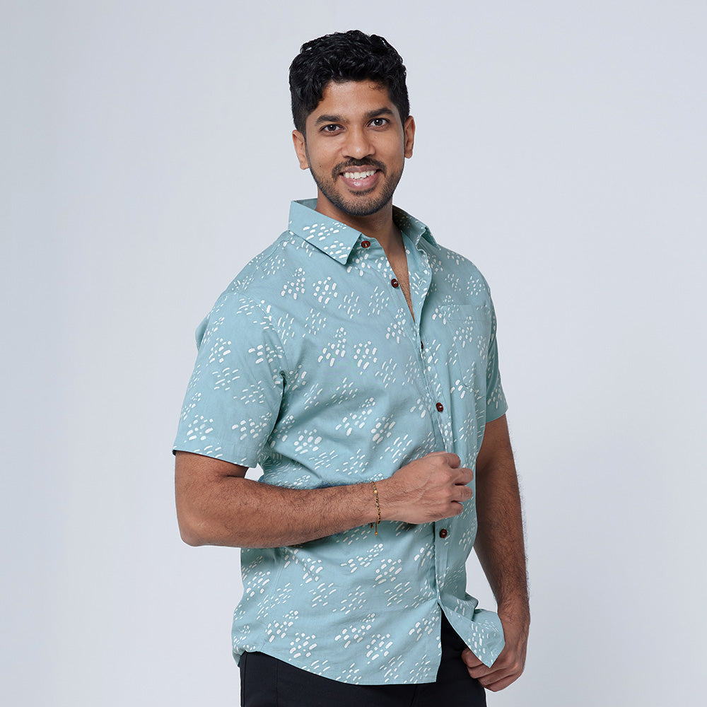 A man wearing batik shirt call Arctic Seeds 