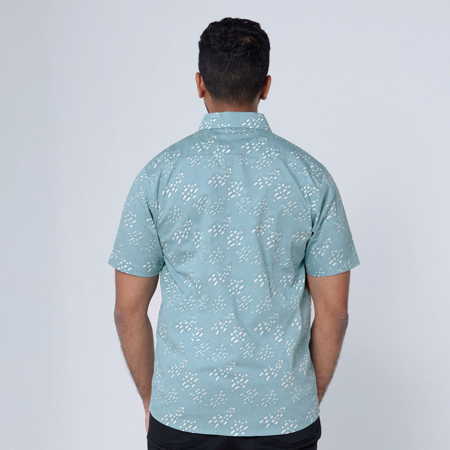 A man wearing batik shirt call Arctic Seeds 